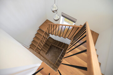 Wooden staircase in the interior of the house