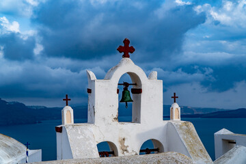 Oia town on Santorini island, Greece. Traditional architecture and famous white houses and churches...