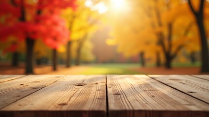 Empty rustic wooden table with blurred background of vibrant autumn forest, for showcasing products, fall-themed designs, or seasonal promotions
