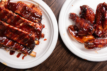 Barbeque Half Rib and Chicken wings on White plates