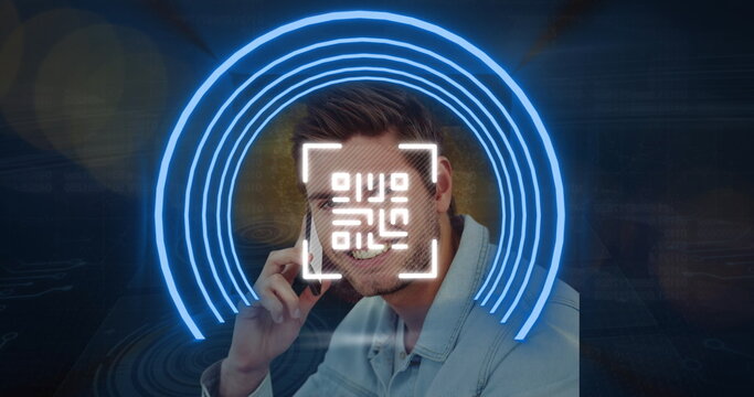 Image of qr code and neon shapes over caucasian businessman on black background