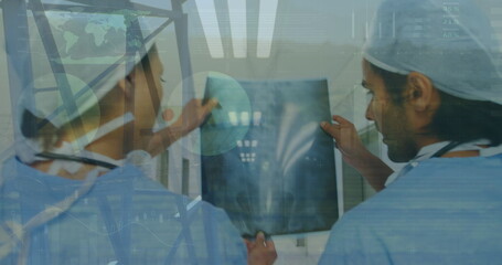 Image of financial data processing over diverse business people using laptop