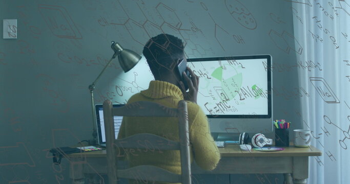 Image of data processing over african american businesswoman using smartphone