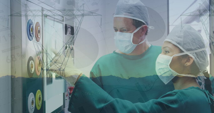 Image of financial graphs over diverse female and male doctors and electricity poles at sunset - Powered by Adobe