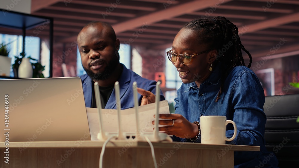 Poster black irritated man and woman rebooting their wireless router and checking network settings, feeling