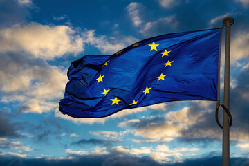 European Union flag. Blue banner with yellow stars