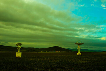 Radio telescopes and the Milky Way at night