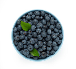 Bowl with fresh blueberries isolated on white,top view