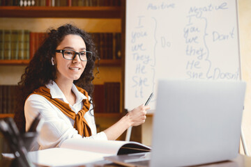 E-learning, Online English Course Concept. Professional female teacher having video call,...