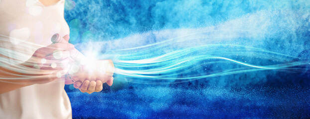 Young woman with Tibetan singing bowl on beige background, closeup