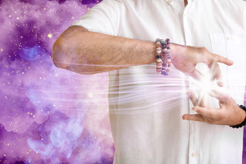 Meditating mature man on color background