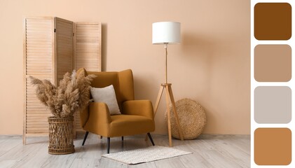 Interior of stylish living room with armchair, lamp and folding screen. Different color patterns