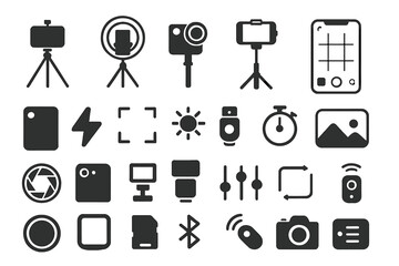 Variety of camera equipment and accessories arranged on a clean background for photography enthusiasts