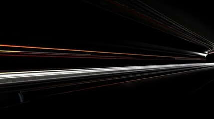 Abstract image of light trails in a tunnel.
