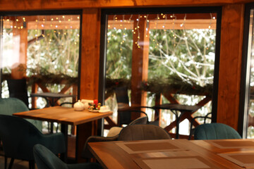 Modern cafe interior with new stylish furniture