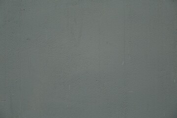 Grey cement textured surface as background, closeup