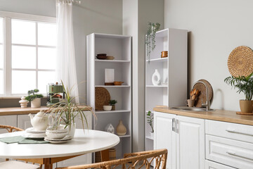 Interior of kitchen with shelf units and counters
