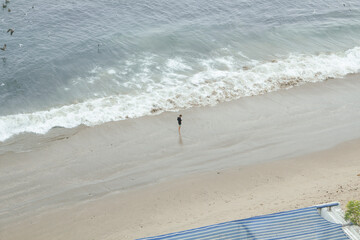 Beach landscapes in summer. Ballenita Beach in the province of Santa Elena, Ecuador. You can see the sea, birds, and beach or sailing motifs.