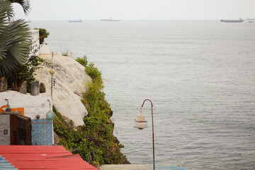Beach landscapes in summer. Ballenita Beach in the province of Santa Elena, Ecuador. You can see the sea, birds, and beach or sailing motifs.