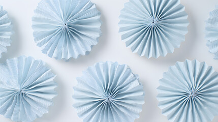 Pastel blue circular decorative elements in flat lay, conveying harmony and delicate elegance