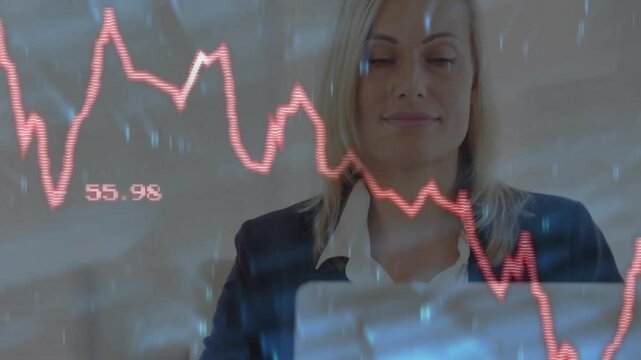 Businesswoman shifting posture as pulsing red line graph displaying finance trends on laptop - Powered by Adobe