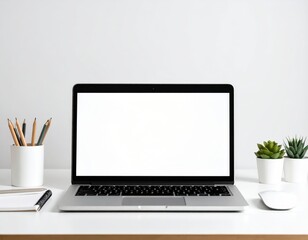 Minimalist workspace featuring a laptop with a blank screen succulents and stationery