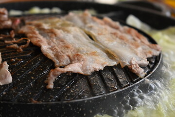 pork barbecue on frying pan, Thai style cuisine