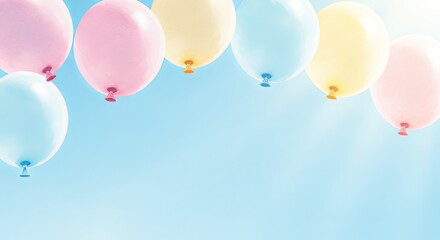 Pastel-colored balloons, including pink, light blue, and yellow, float in a row against soft blue sky, suggesting celebration or festive occasion.copy space, watercolor