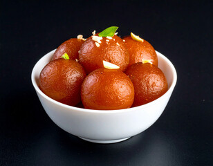 Gulab Jamun isolated on a black background