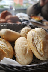 Freshly baked bread rolls in a cozy cafe setting
