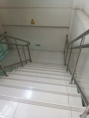 Fototapeta premium Modern Indoor Staircase with Stainless Steel Handrails