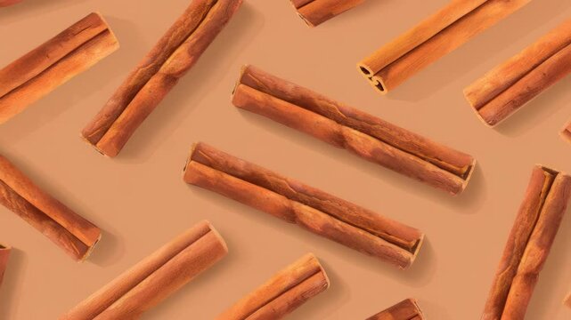 Cinnamon sticks are scattered against a pale brown backdrop, arranged in an appealing pattern that creates warm and inviting aroma for the viewer.