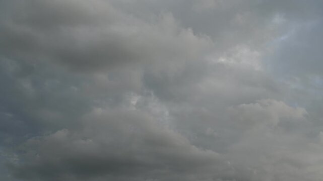 Dramatic Sky with Dark Clouds and Soft Light Peeking Through