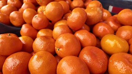 Fresh tangerines available at local market in autumn