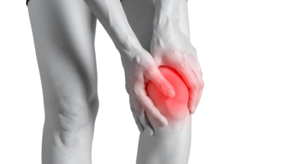 A woman with knee pain, red painful area on the knees. isolated on transparent or white background