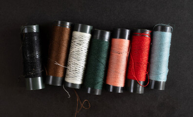 colorful sewing thread isolated background