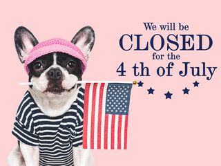 Signboard with the inscription We will be closed for the 4th of July. Cute puppy. Closeup, indoors....