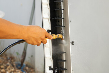 air conditioning cleaning service with water spray