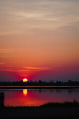 Golden Hour Over Tranquil Thai Reservoir
