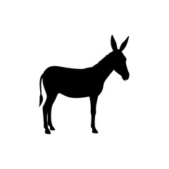 Fototapeta premium Black Silhouette Of a Side View Donkey Standing Quietly vector illustration