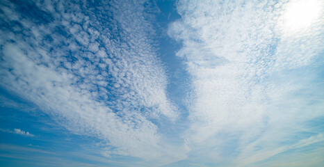 Obraz premium Clouds on the sky. Beautiful sunny sky. Background with clouds on blue sky. Clouds on sky pattern.