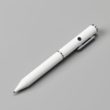 Elegant modern white stylo pen with metallic accents resting on smooth gray surface close up for writing, stationery, office, creativity, and ing themes