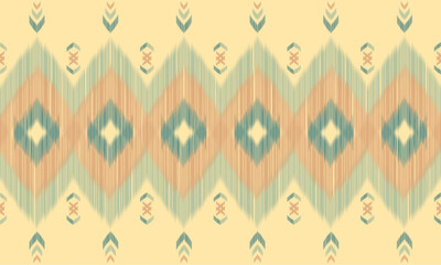 Ikat patterns combine warm pastel tones such as light brown, green and blue. The vertically stacked diamonds create a soft movement, reflecting local culture and craftsmanship in a contemporary style.
