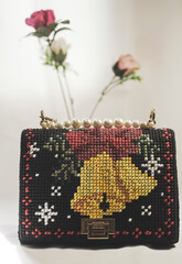 invention of the railway and the rise of travel also contributed to the evolution of the handbag....