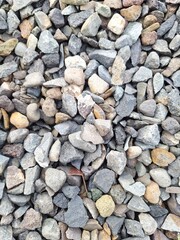 Close-up of colorful gravel stones texture, ideal for construction, landscaping, background, and...