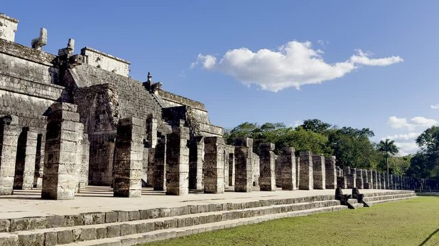 Stone columns and detailed carvings mark the Temple of the Warriors at Chichen Itza, a striking Mayan archaeological site in Mexico.