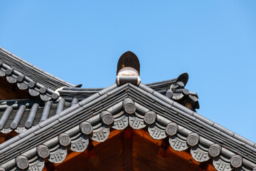eaves and roofs of the traditional Korean buildings in the Buddhist temple