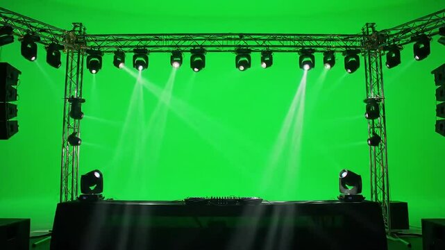 DJ stage lights on green screen background, Light beams,spotlights on stage chroma key. 4k video effect copy space
