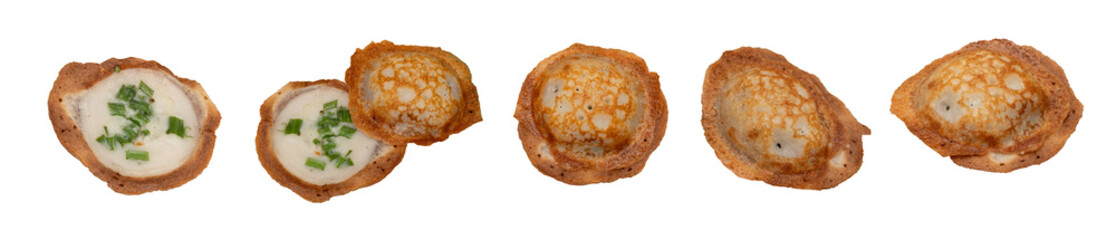 Thai khanom krok coconut pancakes on white background
