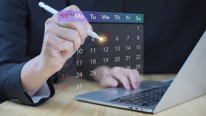 Businessman manages time for effective work. appointment booking, event planning, productivity, Highlight appointment reminders. Time management and scheduling concept with calendar